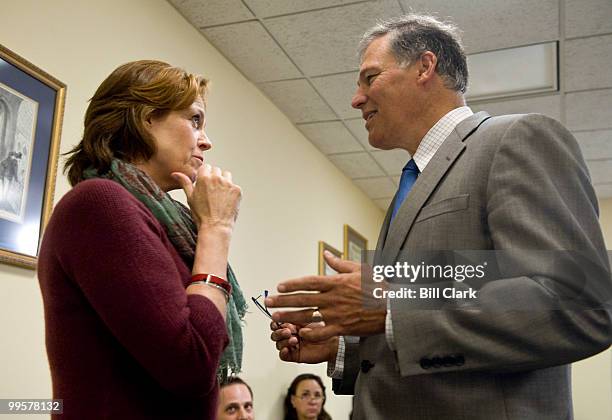 From left, actress Sigourney Weaver, narrator of the NRDC documentary "Acid Test: The Global Challenge of Ocean Acidification," speaks with Rep. Jay...