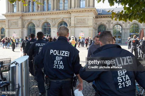 Police officers patrol during the central celebration of the German Unity Day in Mainz, Germany, 03 October 2017. The festivity runs under the motto...