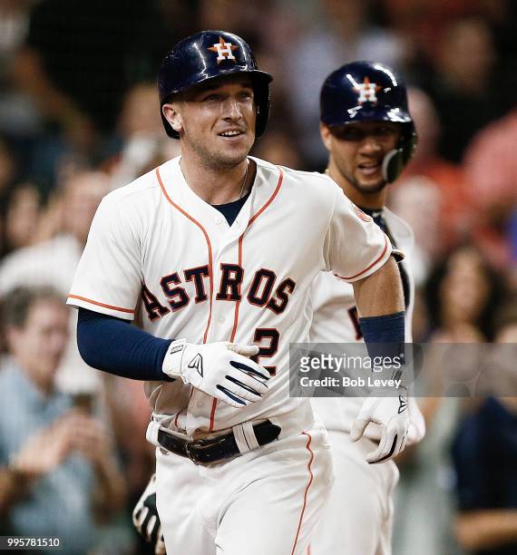 Alex Bregman of the Houston Astros celebrates after hitting his second home run of the game in the seventh inning against the Oakland Athletics at...