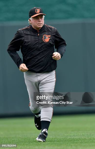 In an August 2015 file image, Baltimore Orioles manager Buck Showalter on the field against the Kansas City Royals at Kauffman Stadium in Kansas...