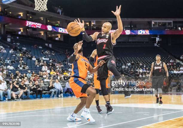Dahntay Jones of Trilogy looses the ball from Baron Davis co-captain of 3's Company during game 1 in week three of the BIG3 3-on-3 basketball league...