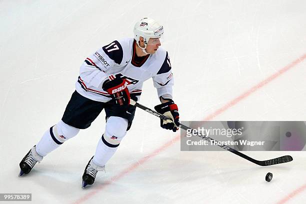 Brandon Dubinsky of USA runs with the puck during the IIHF World Championship final round match between USA and Kazakhstan at Lanxess Arena on May...