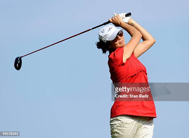 Actress Catherine Bell hits from the tenth tee box during the third round of the BMW Charity Pro-Am at the Thornblade Club held on May 15, 2010 in...