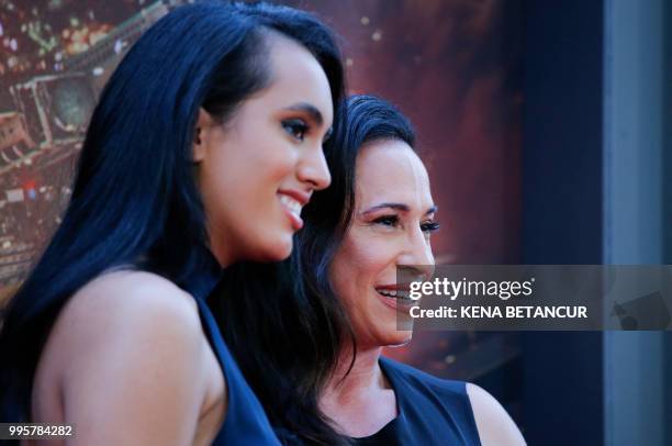 Simone Alexandra Johnson and he rmother producer Dany Garcia attend the premiere of 'Skyscraper' on July 10, 2018 in New York City.