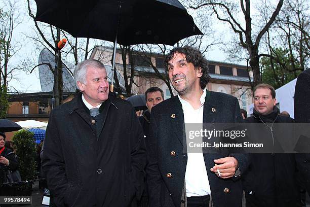 Bavarian state governor Horst Seehofer and theatre director Christian Stueckl arrive for the reception of the Bavarian state governement after the...