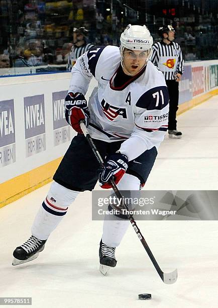 Nick Foligno of USA runs with the puck during the IIHF World Championship final round match between USA and Kazakhstan at Lanxess Arena on May 15,...
