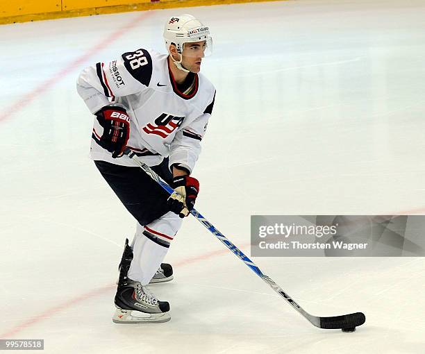 Jack Hillen of USA runs with the puck during the IIHF World Championship final round match between USA and Kazakhstan at Lanxess Arena on May 15,...