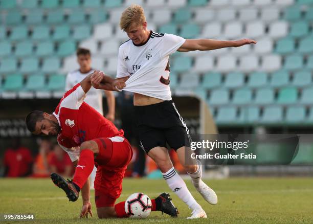 Benfica midfielder Keaton Parks fights for the ball with FK Napredak midfielder Miroljub Kostic during the Pre-Season Friendly match between SL...