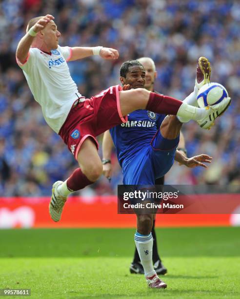 Jamie O'Hara of Portsmouth competes for the ball with Florent Malouda of Chelsea during the FA Cup sponsored by E.ON Final match between Chelsea and...