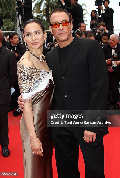 Actors Jean Claude Van Damme and Gladys Portugues attend the 'You Will Meet A Tall Dark Stranger' Premiere held at the Palais des Festivals during...