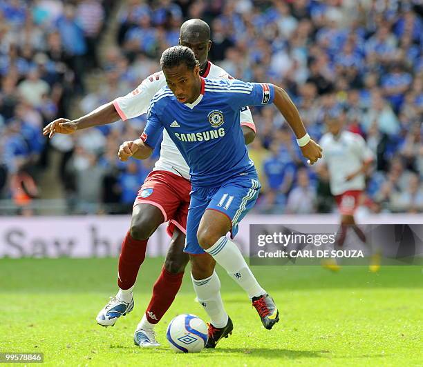 Chelsea's Didier Drogba in action against Portsmouth during the FA Cup Final football match at Wembley, in north London, on May 15, 2010. AFP...