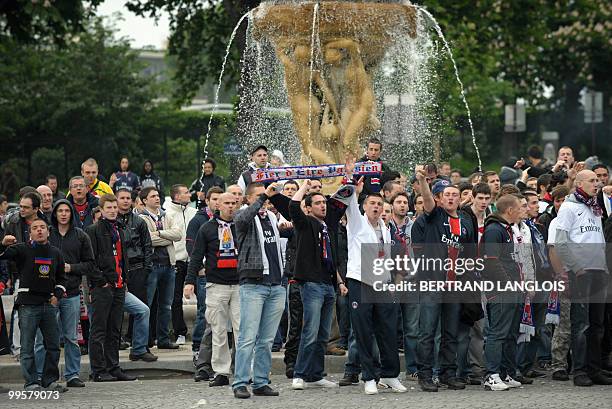 People participate in a "pacific" demonstration of the "Virage d'Auteuil" group of supporters of Paris Saint-Germain football club on May 15, 2010 in...