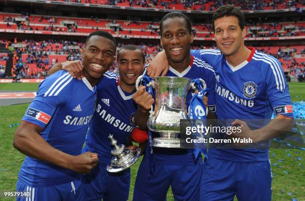 Daniel Sturridge, Ashley Cole, Didier Drogba and Michael Ballack of Chelsea celebrate winning the FA Cup sponsored by E.ON Final match between...