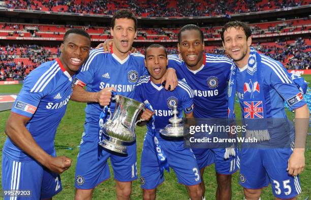Daniel Sturridge, Michael Ballack, Ashley Cole, Didier Drogba and Juliano Belletti of Chelsea celebrate winning the FA Cup sponsored by E.ON Final...