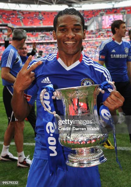 Florent Malouda of Chelsea celebrates with the trophy at the end of the FA Cup sponsored by E.ON Final match between Chelsea and Portsmouth at...