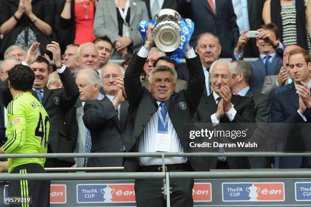 Chelsea Manager Carlo Ancelotti poses with the trophy at the end of the FA Cup sponsored by E.ON Final match between Chelsea and Portsmouth at...