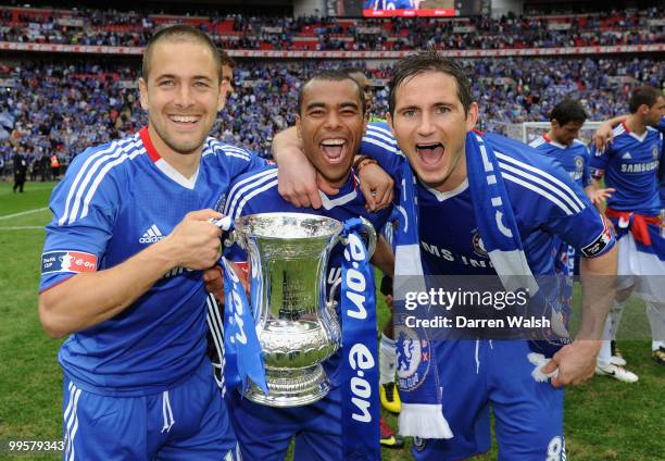 Joe Cole, Ashley Cole and Frank Lampard of Chelsea celebrate winning the FA Cup sponsored by E.ON Final match between Chelsea and Portsmouth at...