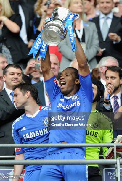 Didier Drogba of Chelsea celebrates with the trophy at the end of the FA Cup sponsored by E.ON Final match between Chelsea and Portsmouth at Wembley...