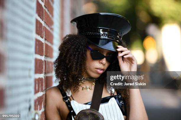 Rachel McGee is seen during July 2018 Men's Fashion week wearing a Forever 21 jump suite and Coach Boots outside of Industria Studios on July 10,...