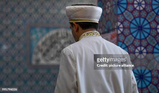 An Imam praying at the Centrum Moschee in Hamburg, Germany, 3 October 2017. Mosques across Germany opened their doors on 3 October for the nationwide...