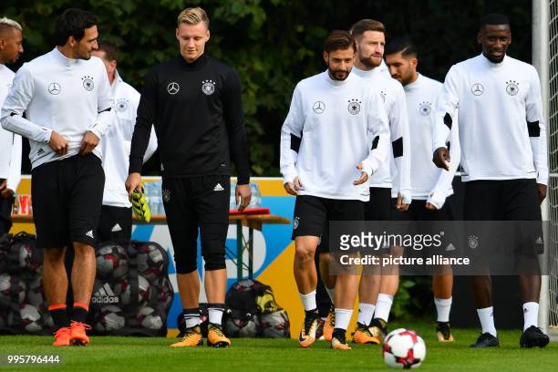Germany's Mats Hummels , goalie Marc-Andre ter Stegen, Marvin Plattenhardt, Shkodran Mustafi, Emre Can and Antonio Ruediger arrive at a Germany...
