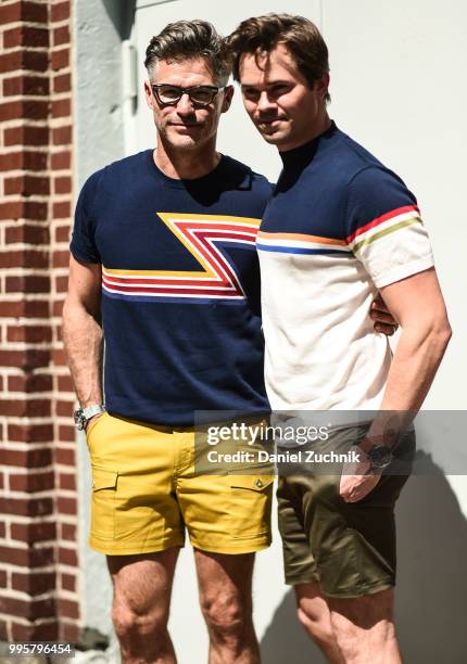 Eric Rutherford and Andrew Rannells are seen outside the Parke and Ronen show during the 2018 New York City Men's Fashion Week on July 10, 2018 in...