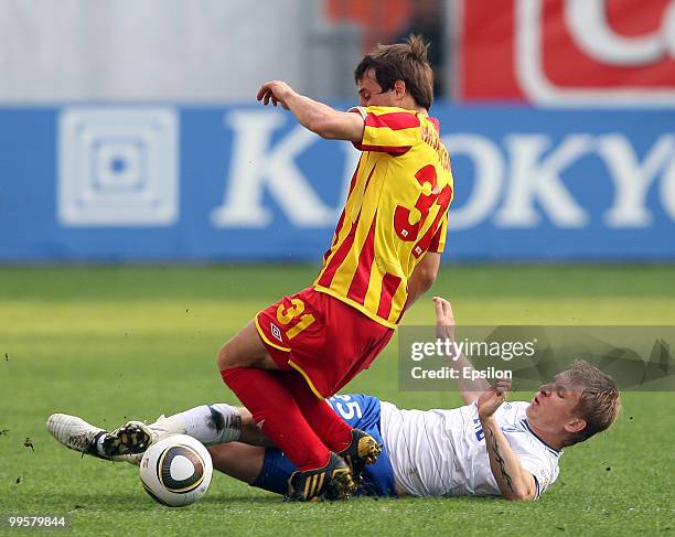 Denis Kolodin of FC Dynamo Moscow battles for the ball with Eldar Nizamutdinov of FC Alania Vladikavkaz during the Russian Football League...