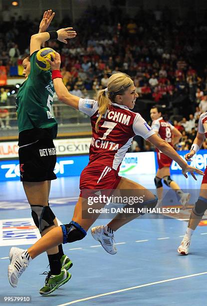 Acimovic Gorica of Viborg vies for the ball with Nechita Adriana of Oltchim Ramnicu Valcea during their second leg women handball Champions League...