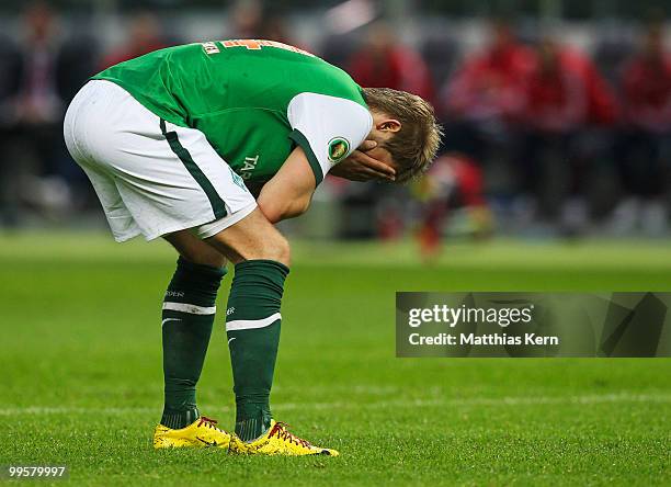 Aaron Hunt of Bremen looks dejected during the DFB Cup final match between SV Werder Bremen and FC Bayern Muenchen at Olympic Stadium on May 15, 2010...