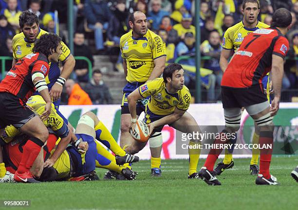 Clermont-Ferrand's scrum half Morgan Parra clears the ball out of a scrum during the French Top 14 semi final rugby union match Clermont-Ferrand...