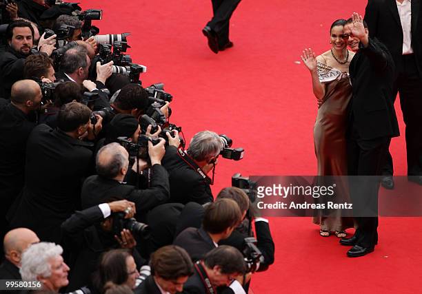 Jean Claude Van Damme and Gladys Portugues attend the "You Will Meet A Tall Dark Stranger" Premiere at the Palais des Festivals during the 63rd...