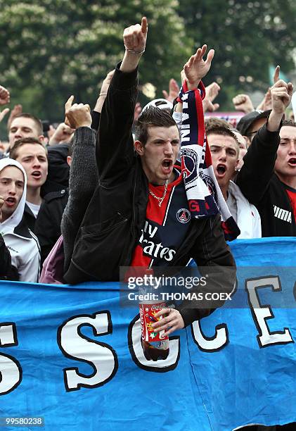 French members of the "Virage d'Auteuil" group of supporters of Paris Saint-Germain football club demonstrate near the Parc des Princes Stadium in...