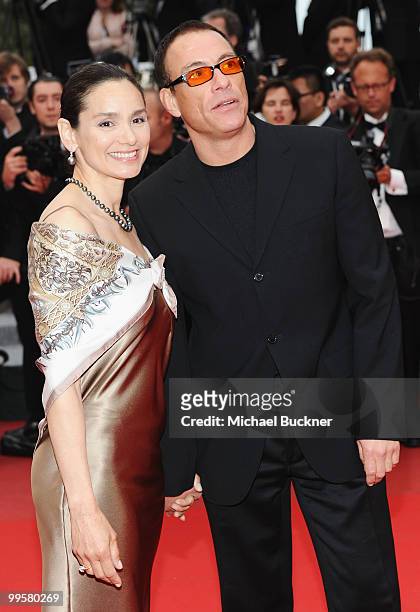 Actors Jean Claude Van Damme and Gladys Portugues attend the "You Will Meet A Tall Dark Stranger" Premiere at the Palais des Festivals during the...