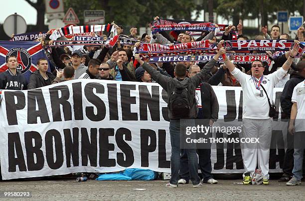 French members of the "Virage d'Auteuil" group of supporters of Paris Saint-Germain football club demonstrate near the Parc des Princes Stadium in...