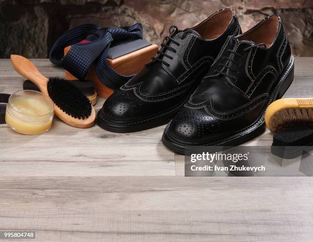 shoe care and gentleman's accessories with free space - care free ストックフォトと画像
