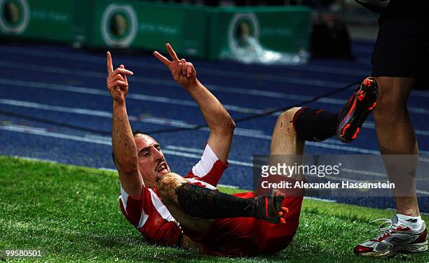 Franck Ribery of Bayern celebrates after scoring his team's third goal during the DFB Cup final match between SV Werder Bremen and FC Bayern Muenchen...