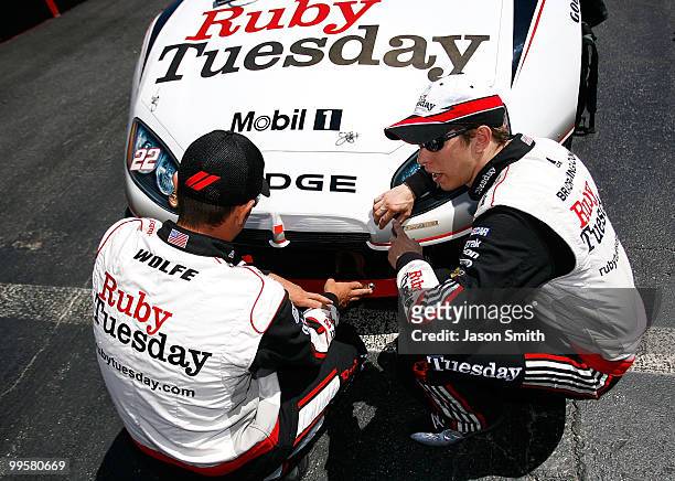 Brad Keselowski , driver of the Ruby Tuesday Dodge, talks with his crew chief Paul Wolfe on the grid prior to the start of NASCAR Nationwide Series...