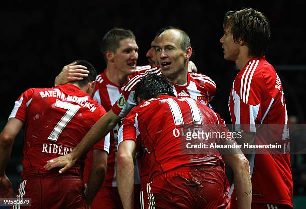 Player of Bayern Munich celebrate their third goal during the DFB Cup final match between SV Werder Bremen and FC Bayern Muenchen at Olympic Stadium...