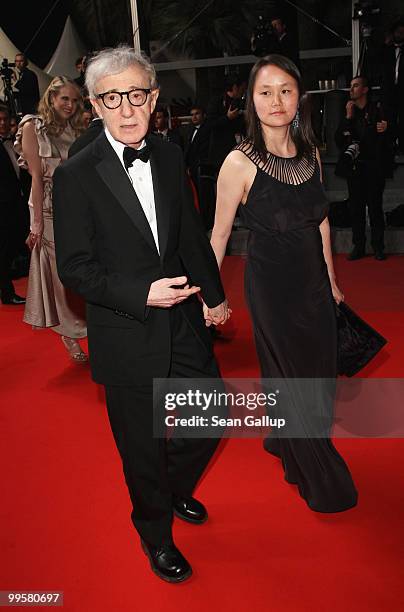 Director Woody Allen and his wife Soon-Yi Previn departs the "You Will Meet A Tall Dark Stranger" Premiere at the Palais des Festivals during the...