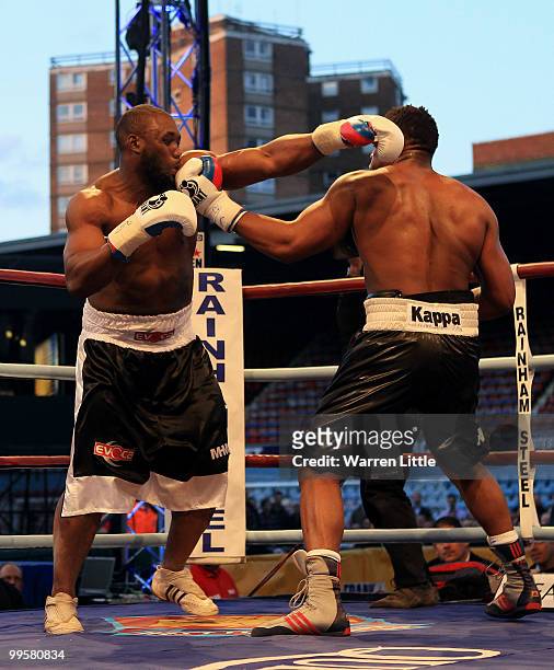 Danny Williams is knocked out by Dereck Chisora during The British Heavyweight Championship at Boleyn Ground on May 15, 2010 in London, England.