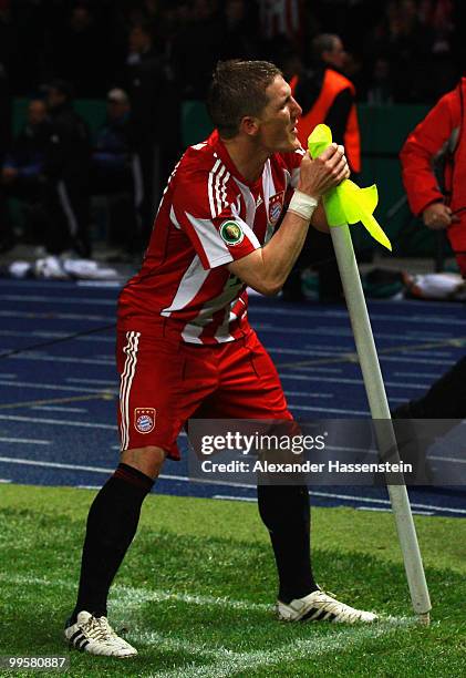 Bastian Schweinsteiger of Bayern celebrates after scoring his team's fourth goal during the DFB Cup final match between SV Werder Bremen and FC...