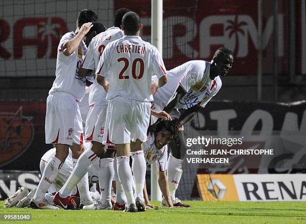 Nancy's players celebrate after scoring a goal during the French L1 football match Nancy vs Valenciennes at the Marcel Picot Stadium, on May 15, 2010...