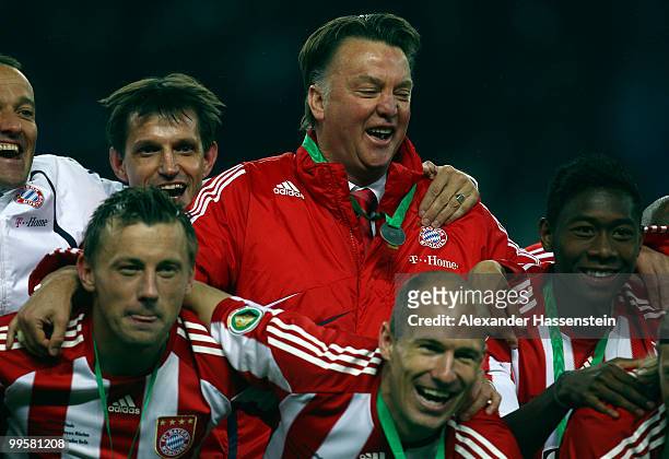 Head coach Louis van Gaal of Bayern celebrates after winning the DFB Cup final match between SV Werder Bremen and FC Bayern Muenchen at Olympic...