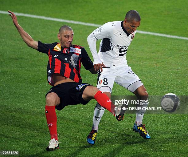 Boulogne's midfielder Laurent Agouzi vies with Rennes' midfielder Sylvain Marveaux during the French L1 football match Boulogne sur mer vs Rennes on...