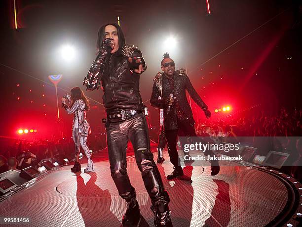 Singers Fergie, Taboo, will.i.am and Apl De Ap of the US-American Band Black Eyed Peas perform live during a concert at the O2 World on May 15, 2010...