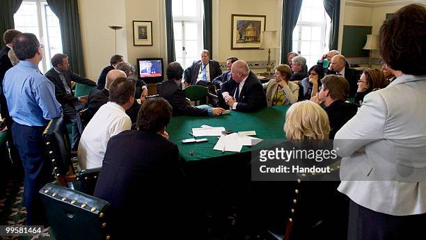In this handout image provided by the Conservative Party, Leader of the Conservative Party David Cameron with the Shadow Cabinet in his office in...