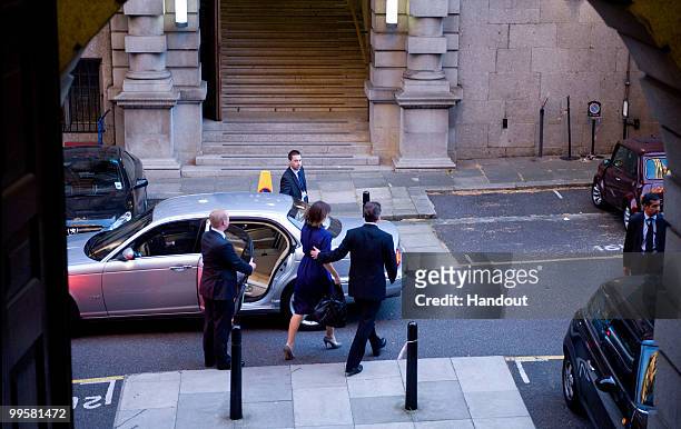 In this handout image provided by the Conservative Party, Leader of the Conservative Party David Cameron leaves his office in Portcullis House,...