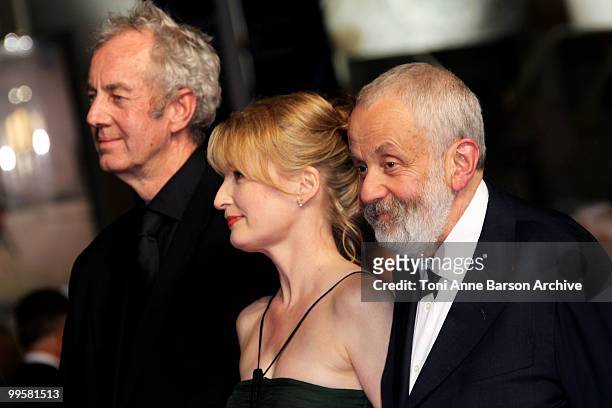 Cinematographer Dick Pope, actress Lesley Manville and director Mike Leigh attend the 'Another Year' premiere held at the Palais des Festivals during...