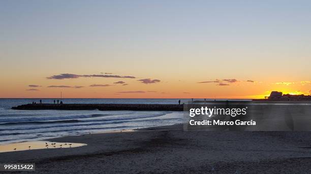 atardecer - atardecer stockfoto's en -beelden