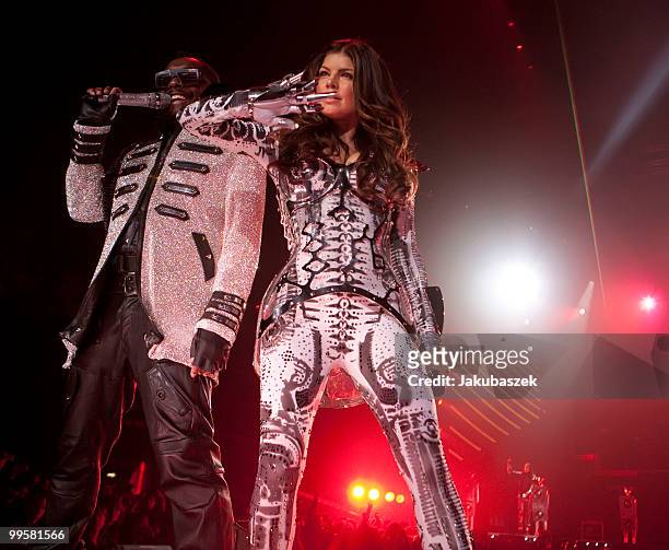 Singers Will.i.am and Fergie of the US-American hip-hop band Black Eyed Peas perform live during a concert at the O2 World on May 15, 2010 in Berlin,...